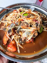 Som tum or papaya salad with Shrimp in food tray. Thai food concept.