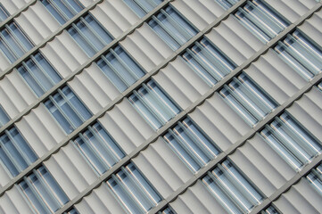 background with  diagonally metal and glass facade in Madrid. Spain
