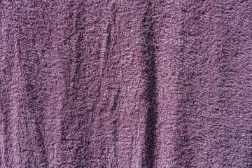 Background from a textural lilac towel.