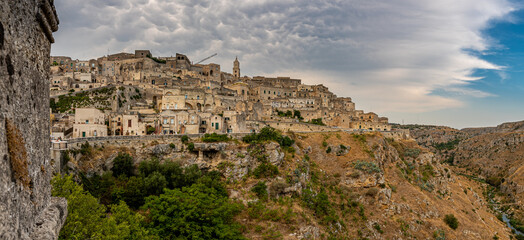 Fototapeta premium Matera is a city in Italy. The Sassi di Matera, is a complex of cave dwellings carved into the ancient river canyon, often cited as 