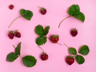 Pattern of strawberries and strawberry leaves.