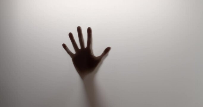 Silhouette. Creepy hand appears suddenly. Abstract background