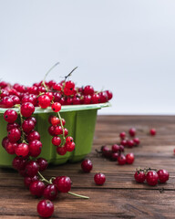 fresh summer red currant in a green bowl