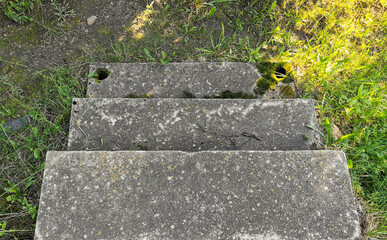 old concrete stairs leading to the meadow
