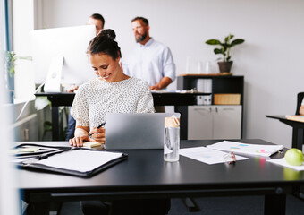 Smiling businesswoman working in an office