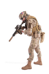 Portrait Of A Soldier Holding Gun against a white background. isolated. u.s. soldier