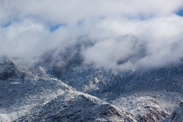Winter mountain with snow and cloud