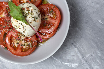 Healthy Homemade Tomato Salad with Mozzarella, Anchovies and Oregano