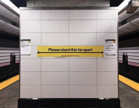 "Please Stand This Far Apart" Sign in MTA Subway Stations Encouraging People to Stand 6 Feet Apart