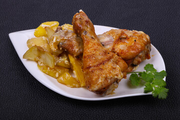 Roasted chicken legs with potato