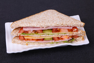 Club sandwich with ham and cheese
