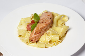 Salmon steak with pasta