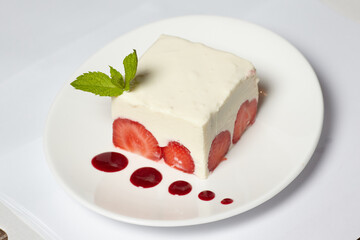 Cake with strawberry on the table