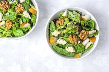 Homemade lettuce assortment salad with blue cheese, walnuts and pear