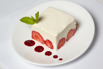 Cake with strawberry on the table