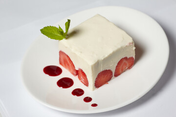 Cake with strawberry on the table
