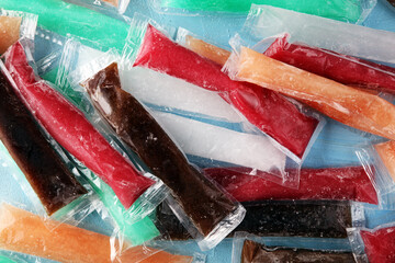Colorful frozen fruit bar ice pops. Frozen Popsicles