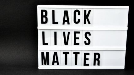 BLACK LIVES MATTER text on a black background. Freedom of Speech Vintage Retro quote board. Protest...