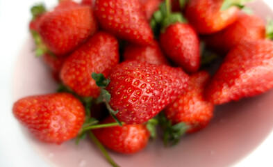 Natural ripe red strawberries. Fresh close-up berries as vegetarian or healthy eating concept. Tasty snack.
