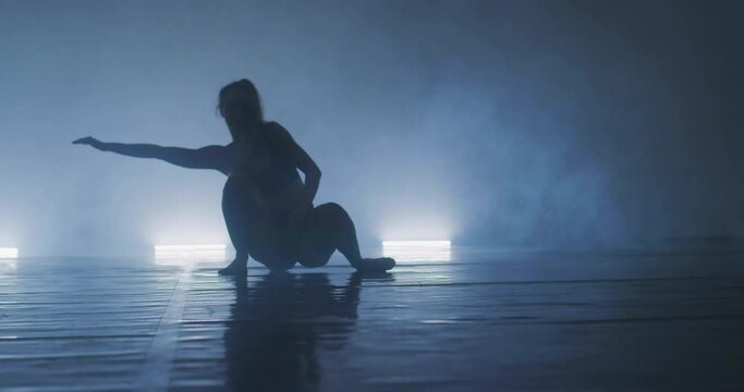 Contemporary dancing performers in dance practice class