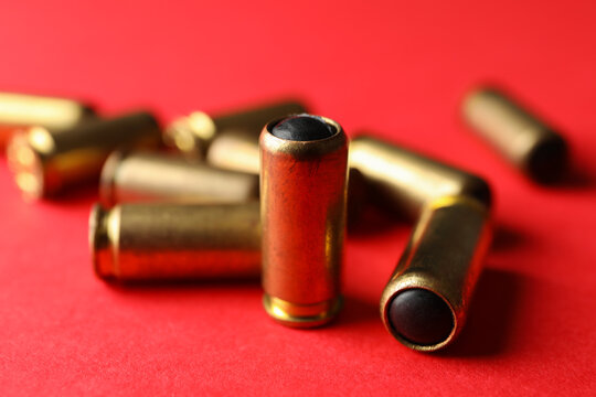 Rubber Bullets On Red Background, Close Up