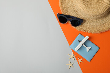 Travel accessories on two tone background, top view. Travel blogger