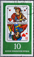 GERMANY, DDR - CIRCA 1967: a postage stamp from Germany, GDR showing german playing cards: Herzunter / Herzbube