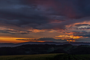 Sunset in hot summer rainy evening near Roprachtice village