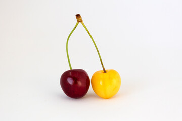 two cherries on white background