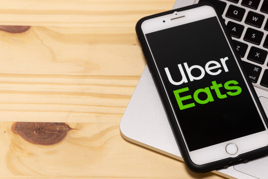 December  24, 2019, Brazil. Uber Eats application icon on Apple iPhone smartphone screen close-up. Uber eats app icon. Social network. Social media icon.