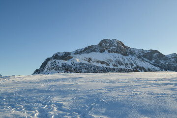 Oberbauenstock peak hiding behind the snow cover in Switzerland