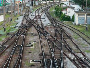 railroad tracks diverging in different directions