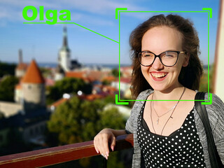 Facial Recognition System concept. The face of a young girl. Biometric protection