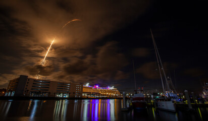 A SpaceX launch from Cape Canaveral Air Force Station, Florida while looking over Port Canaveral.