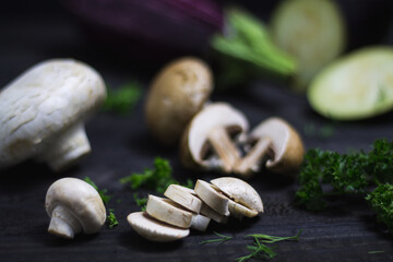 Some vegetables with mushrooms in focus.