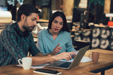 Attentive boss giving pieces of advice to her employee