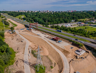 Aerial view of bridge construction works. New bridge is being built next to the old one. 