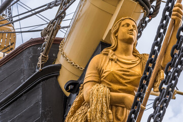 Golden figurehead in the bow of the frigate Jylland - obrazy, fototapety, plakaty