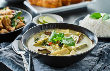 thai green curry with chicken and eggplant in bowl