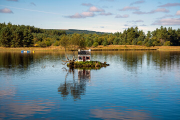Fototapeta premium River Shin at Lairg - Model House on Island