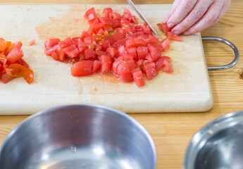 Preparing tomatoes.