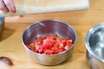 Preparing tomatoes.