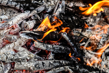 Fire. Burning charcoal in the grill.