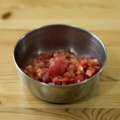 Preparing tomatoes.