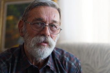 Portrait of a smiling handsome senior man. 