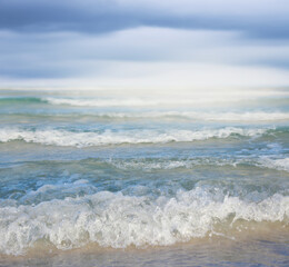 Sea wave on the sandy beach.Summer vacation background.