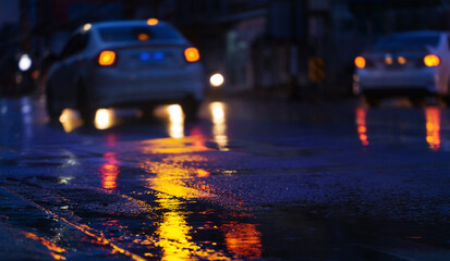 Night scene of city light after hard rain fall.