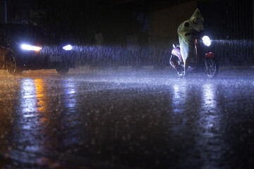 Night scene of city during hard rain fall.Selective focus.