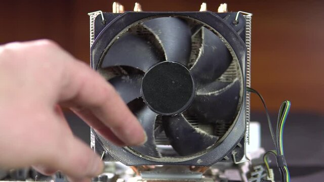 Demonstration of dust pollution. Dirty cooler and CPU heatsink from dust. 4k.
