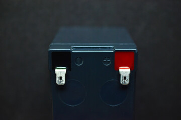 Lead battery from an uninterruptible power supply on a black background